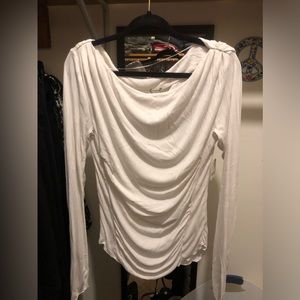 Free People white slouchy long sleeve tee shirt.